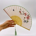 Handcrafted Suzhou embroidery folding fan with peach blossom and silk tassel - 2026 Hot Selling Item - Suzhou Embroidery Fan - Peach Blossom Dream
