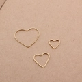 Three assorted sizes of minimalist gold heart-shaped metal frame charms for DIY jewelry making - Gold Heart Style (Large)