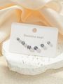 Trois paires de boucles d'oreilles en acier inoxydable avec zircons ronds sur pierre - Clous d'Oreilles en Zircone Bleu Clair (3 Paires)