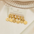 Set of 6 pairs of gold stainless steel earrings featuring star, moon, and flower charms - Bear Style