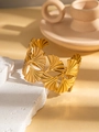 Macro shot of 18K gold plated ginkgo leaf bracelet showing detailed texture and veins - Ginkgo Leaf Splicing Hollow Style