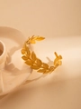 Detail of 18K gold-plated titanium steel bracelet featuring elegant olive leaf texture - Greek Retro Olive Branch Style