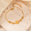 Detail of gold flower bracelet with emerald crystal petals and adjustable steel chain - Flower Star White Style (BJGB0021B)