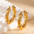 Macro detail of 18K gold bamboo hoop earrings with high polished stainless steel finish - Bamboo Joint Hoop Style (E1362) / Gold