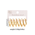 Close-up of three pairs of gold stainless steel hoop earrings with wavy design on card - Wave Shape Style (ZYGE1261)
