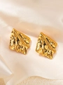 Irregular golden metal heart earrings with a hammered liquid metal finish and texture - Twisted Metallic Sheet Style