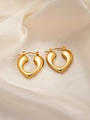 Macro shot of polished gold irregular heart-shaped earrings on cream satin fabric - Heart E0171 Style