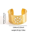 Detail view of gold cuff bracelet with sunburst gem inlay and textured surface - Eight-Petal Flower Hammered Style (BJGB0204)