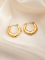 Detail view of gold U-shaped geometric earrings with ribbed texture on silk background - Heart E0169 Style