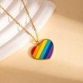 Gold stainless steel necklace with a rainbow striped heart pendant on a display stand - Diagonal Striped Rainbow Heart Necklace (BJGN0472)
