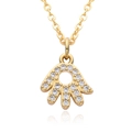 Detailed macro view of a gold Hamsa hand pendant necklace with sparkling white zircons - Zirconia Pave Hamsa Hand Style (A211)
