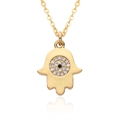 Close-up of golden Hamsa hand pendant necklace with evil eye and white sparkling crystals - Evil Eye Hamsa Hand Style (A212)