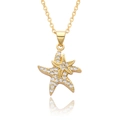 Elegant gold double starfish pendant necklace with sparkling cubic zirconia on white background - Double Sea Star Charm Necklace (c526)