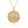Detailed macro view of the gold-plated evil eye pendant with sparkling zircon inlays - Metal Bead Pave Eye Round Style (c520)