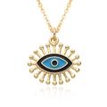 Minimalist evil eye pendant necklace with blue enamel and gold-plated finish on white background - Black and Blue Eye Style (B257)
