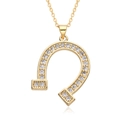Elegant gold horseshoe pendant necklace with sparkling cubic zirconia on a white background - Horseshoe Lucky Style (E392)