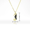 Detailed view of 18k gold dolphin pendant with black pave stones measuring 28mm x 13mm - Gold Seahorse Shape (H296)
