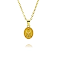 Macro detail of oval gold necklace with religious Virgin Mary pendant and rays - Gold Virgin Mary (A292)