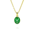 Detailed close-up of a vintage gold oval pendant with green enamel and Mary relief - Green Virgin Mary (A293)