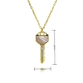 Detail shot of a 30mm gold heart key pendant with pink shell inlay and white zircon stones - Pink Purple Shell Key Necklace (E574)