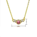 Minimalist gold necklace with pink zircon pendant and white stones on white background - Three-Stone Horizontal Style / Gold Style (C1036)