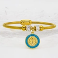 Detailed shot of golden snake chain bracelet with Saint Benedict charm and blue enamel - 21cm / Sky Blue (A005)