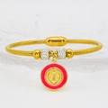 Detail of gold magnetic bangle with red religious medal and rhinestone cylinder charms - Bright Red (A014)
