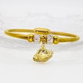 Macro shot of gold snake chain bracelet with sparkling zircon charms and planet pendant - 16cm / Planet Style (A240)