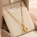 Elegante collana dorata con ciondolo a goccia d'acqua e pietra mobile in astuccio - Oro - Collana Sacchetto Dinamico