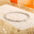 Elegant stainless steel bangle with white shell inlay and sparkling cubic zirconia stones - Silver