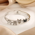 Elegant silver titanium steel bracelet featuring four butterflies with shell and matte finish - Steel