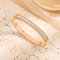 Rose gold double row petal bangle with cubic zirconia on beige stone base - Rose Gold