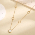 Elegant gold titanium necklace featuring white mother of pearl and five-leaf flower charms - Double Sided Black and White Flower Style (X016)