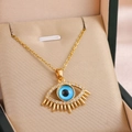 Gold plated evil eye necklace with blue stone and white zircons on beige jewelry box - Gold (9250)
