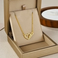 Gold infinity heart necklace for women with micro-paved cubic zirconia accents - Gold Heart Infinity Style (1029)