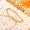 18k rose gold plated stainless steel starburst bangle with zircon inlays and clasp - Rose Gold