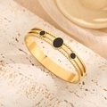 Golden titanium steel hinged bracelet with black enamel accents and retro beaded edge detail - Gold (Z612)