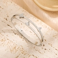Silver double-layer butterfly bracelet with rhinestones and matte charms on stone tray - Steel