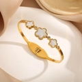 Golden clover open bangle with white shell flowers and crystals on silk background - Gold