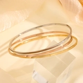 Minimalist titanium steel ring bracelets set in gold, silver and rose gold finishes - Plain Bangle / 65mm Diameter / Rose Gold