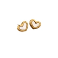 Close-up of heart-shaped gold stud earrings with elegant white mother of pearl inlay - Heart Shell Stud Earrings