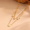 Elegante collar de doble capa dorado con colgantes de mariposa de nácar blanco - Collar de Mariposa Dorado (T509)
