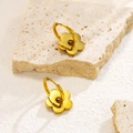 Exquisite gold floral hoop earrings with brushed finish on a natural stone base - Gold Flower Hoop Earrings
