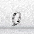 Silver Roman numeral ring in stainless steel with crystal accent on glitter background - Size 5 / Roman Numerals Hollow Style / Steel