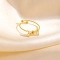 Bague nœud dorée ajustable avec zircons jaunes et anneau à texture torsadée - Style de Nœud Jaune