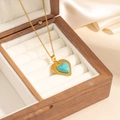 Golden necklace featuring a heart-shaped turquoise pendant on a delicate chain - Heart Turquoise Necklace (0849)
