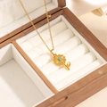 Vintage golden flower necklace with turquoise stone center in a velvet jewelry box - Small Flower Turquoise Necklace (0851)