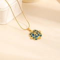 Vintage gold necklace with round blue enamel flower pendant on a warm background - Geometric Square Flower Necklace (0867)