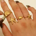 Set of four 18K gold plated stainless steel open rings with starfish and seashell charms - Ocean 4-Piece Style (44) / Set of 4 / Gold
