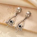 Boucles d'oreilles créoles en acier argenté avec breloque œil et éclats brillants - Style Mauvais Œil Goutte d'Eau Argenté (5058)